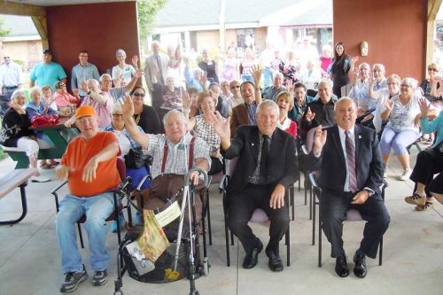 Dignitaries, residents, staff and guests at the celebration of the redevelopment of the Pine Meadow Nursing Home on September 11